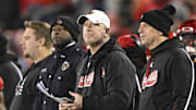 Nov 23, 2024; Louisville, Kentucky, USA;  Louisville Cardinals head coach Jeff Brohm looks toward the scoreboard during the second half against the Pittsburgh Panthers at L&N Federal Credit Union Stadium. Louisville defeated Pittsburgh 37-9. Mandatory Credit: Jamie Rhodes-Imagn Images