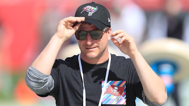 Tampa Bay Buccaneers assistant general manager Mike Greenberg stands on the sidelines before a regular season game.