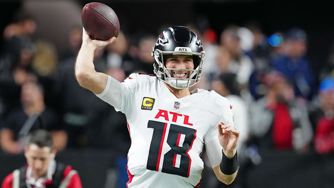 Dec 16, 2024; Paradise, Nevada, USA; Atlanta Falcons quarterback Kirk Cousins (18) warms up before a game against the Las Vegas Raiders at Allegiant Stadium. Mandatory Credit: Stephen R. Sylvanie-Imagn Images