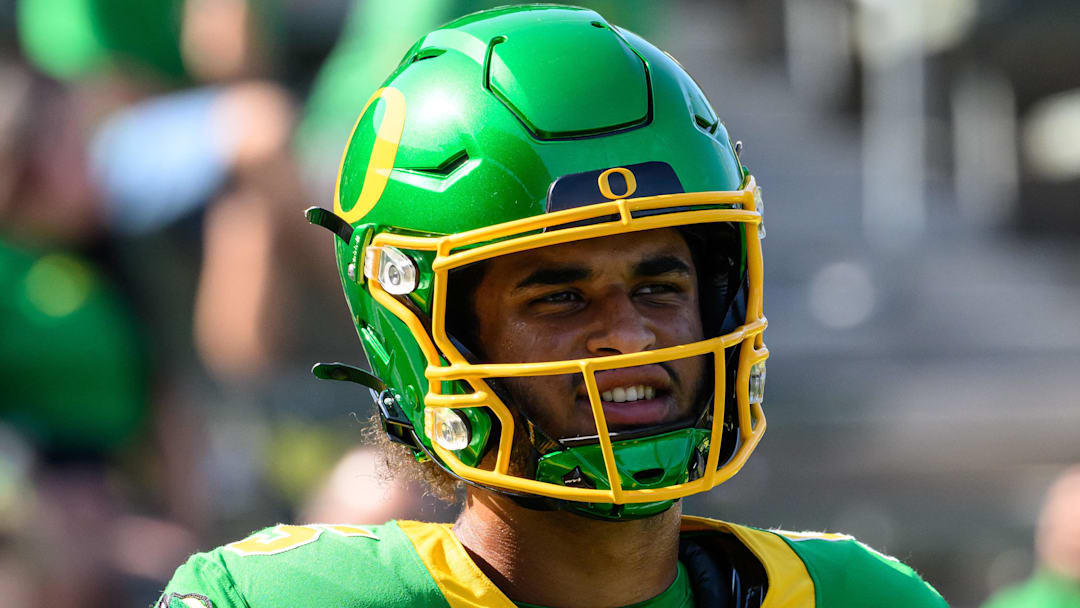 Aug 31, 2024; Eugene, Oregon, USA; Oregon Ducks quarterback Dante Moore (5) warms up before the game against the Idaho Vandals at Autzen Stadium. 