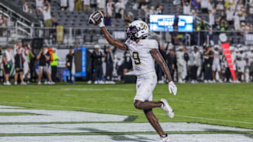 Aug 28, 2025; Orlando, Florida, USA; UCF Knights wide receiver DJ Black (9) reacts after scoring the game winning touchdown during the second half against the Jacksonville State Gamecocks at Acrisure Bounce House. Mandatory Credit: Mike Watters-Imagn Images