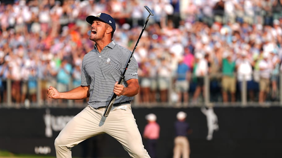 Bryson DeChambeau celebrates after putting out on the eighteenth green to win the 2024 U.S. Open.