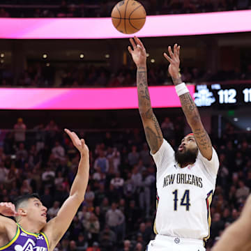 Nov 27, 2023; Salt Lake City, Utah, USA; New Orleans Pelicans forward Brandon Ingram (14) shoots the ball over Utah Jazz forward Simone Fontecchio (16) during the final seconds of the game at Delta Center. Mandatory Credit: Rob Gray-Imagn Images