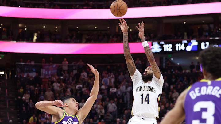 Nov 27, 2023; Salt Lake City, Utah, USA; New Orleans Pelicans forward Brandon Ingram (14) shoots the ball over Utah Jazz forward Simone Fontecchio (16) during the final seconds of the game at Delta Center. Mandatory Credit: Rob Gray-Imagn Images