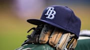 Aug 15, 2015; Arlington, TX, USA; A view of a Tampa Bay Rays ball cap and glove during the game between the Texas Rangers and the Tampa Bay Rays at Globe Life Park in Arlington. The Rangers defeated the Rays 12-4. Mandatory Credit: Jerome Miron-Imagn Images