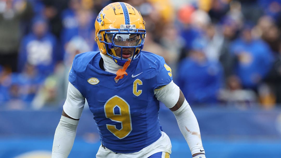Pittsburgh Panthers linebacker Kyle Louis in pass action against the Miami Hurricanes during the third quarter at Acrisure Stadium during the 2025 season. Pittsburgh Panthers linebacker Kyle Louis in pass action against the Miami Hurricanes during the third quarter at Acrisure Stadium during the 2025 season.