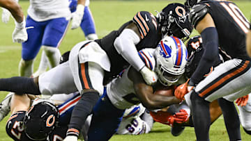 Aug 17, 2025; Chicago, Illinois, USA;  Buffalo Bills cornerback Brandon Codrington (29) runs the ball against Chicago Bears linebacker Ruben Hyppolite II (47) during the second half at Soldier Field. Mandatory Credit: Matt Marton-Imagn Images