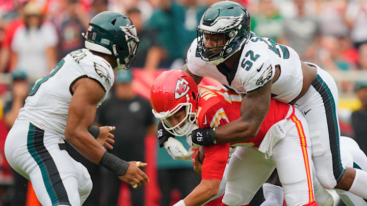 Philadelphia Eagles defensive end Za'Darius Smith (52) sacks Kansas City Chiefs quarterback Patrick Mahomes (15) during the second quarter of the game at GEHA Field at Arrowhead Stadium.
