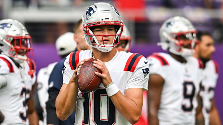 Aug 16, 2025; Minneapolis, Minnesota, USA;  New England Patriots quarterback Drake Maye (10) warms up before the game against the Minnesota Vikings at U.S. Bank Stadium. Mandatory Credit: Jeffrey Becker-Imagn Images