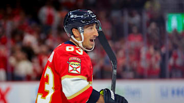 Oct 9, 2025; Sunrise, Florida, USA;  Florida Panthers left wing Brad Marchand (63) celebrates after scoring against the Philadelphia Flyers during the third period at Amerant Bank Arena. Mandatory Credit: Sam Navarro-Imagn Images