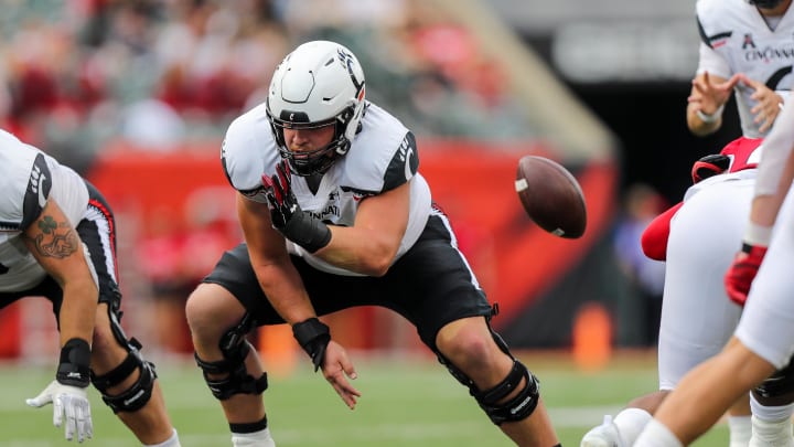 Sep 17, 2022; Cincinnati, Ohio, USA; Cincinnati Bearcats offensive lineman Gavin Gerhardt (53) snaps the ball against the Miami Redhawks in the second half at Paycor Stadium. Mandatory Credit: Katie Stratman-USA TODAY Sports