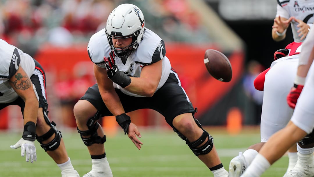 Sep 17, 2022; Cincinnati, Ohio, USA; Cincinnati Bearcats offensive lineman Gavin Gerhardt (53) snaps the ball against the Miami Redhawks in the second half at Paycor Stadium.