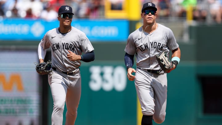 Jul 31, 2024; Philadelphia, Pennsylvania, USA;  New York Yankees outfielder Aaron Judge (R) and outfielder Juan Soto (L) run from the outfield after the sixth inning against the Philadelphia Phillies at Citizens Bank Park. Mandatory Credit: Bill Streicher-USA TODAY Sports