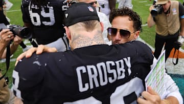 Miami Dolphins head coach Mike McDaniel and Las Vegas Raiders defensive end Maxx Crosby