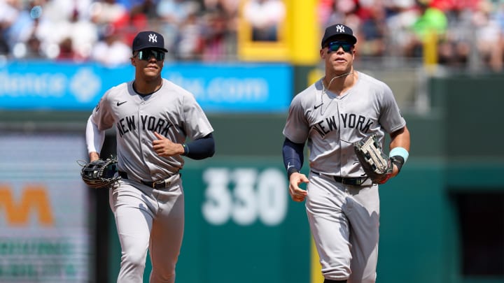 Jul 31, 2024; Philadelphia, Pennsylvania, USA;  New York Yankees outfielder Aaron Judge (R) and outfielder Juan Soto (L) run from the outfield after the sixth inning against the Philadelphia Phillies at Citizens Bank Park. Mandatory Credit: Bill Streicher-USA TODAY Sports