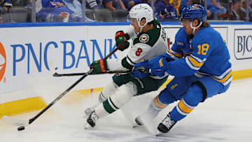Robert Thomas engaged with rookie Wild Zeev Buium