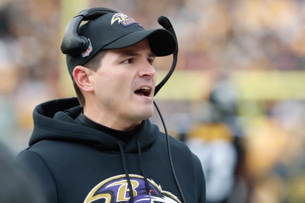 Baltimore Ravens defensive coordinator Mike Macdonald reacts on the sidelines.