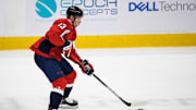 Mar 28, 2021; Washington, District of Columbia, USA; Washington Capitals left wing Jakub Vrana (13) skates with the puck against the New York Rangers during the second period at Capital One Arena. Mandatory Credit: Scott Taetsch-Imagn Images
