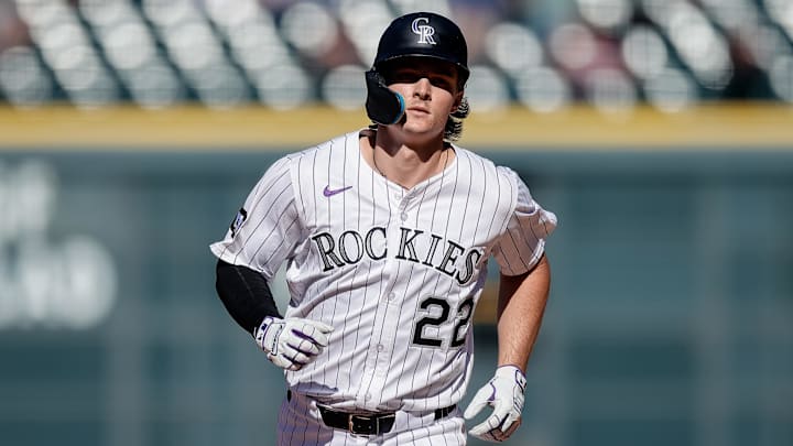 Sep 18, 2025; Denver, Colorado, USA; Colorado Rockies center fielder Mickey Moniak (22) rounds the bases on a two run home run in the ninth inning against the Miami Marlins at Coors Field. Mandatory Credit: Isaiah J. Downing-Imagn Images