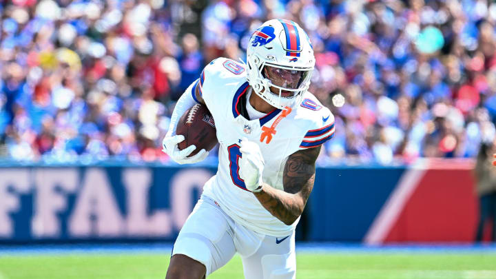 Aug 10, 2024; Orchard Park, New York, USA; Buffalo Bills wide receiver Keon Coleman (0) runs with the ball after a catch in the second quarter of a pre-season game against the Chicago Bears at Highmark Stadium. Mandatory Credit: Mark Konezny-USA TODAY Sports