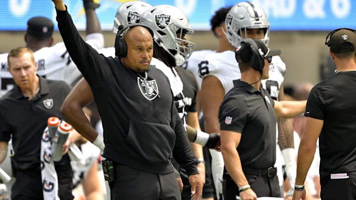 Sep 8, 2024; Inglewood, California, USA; Las Vegas Raiders head coach Antonio Pierce waves to the crowd after a play the first half against the Los Angeles Chargers at SoFi Stadium. Mandatory Credit: Jayne Kamin-Oncea-Imagn Images