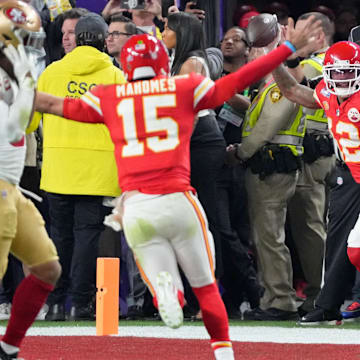 Feb 11, 2024; Paradise, Nevada, USA; Kansas City Chiefs wide receiver Mecole Hardman Jr. (12) celebrates after a game winning catch for a touchdown against the San Francisco 49ers during overtime of Super Bowl LVIII at Allegiant Stadium. 