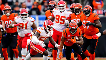 Cincinnati Bengals running back Joe Mixon (28) turns downfield after completing a catch as Kansas City Chiefs middle linebacker Willie Gay Jr. (50) defends in the second quarter during a Week 17 NFL game, Sunday, Jan. 2, 2022, at Paul Brown Stadium in Cincinnati.

Kansas City Chiefs At Cincinnati Bengals Jan 2