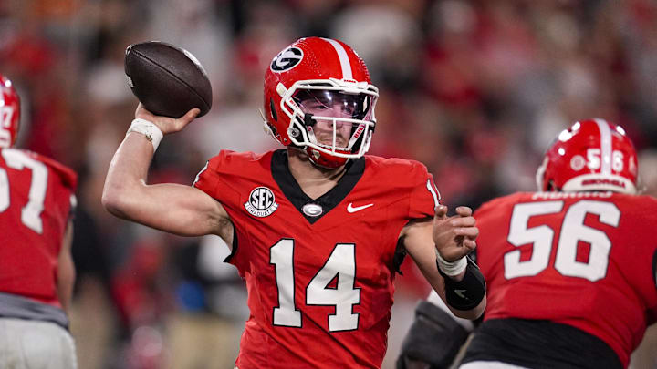 Nov 15, 2025; Athens, Georgia, USA; Georgia Bulldogs quarterback Gunner Stockton (14) throws a pass in the second half against the Texas Longhorns at Sanford Stadium. Mandatory Credit: Dale Zanine-Imagn Images