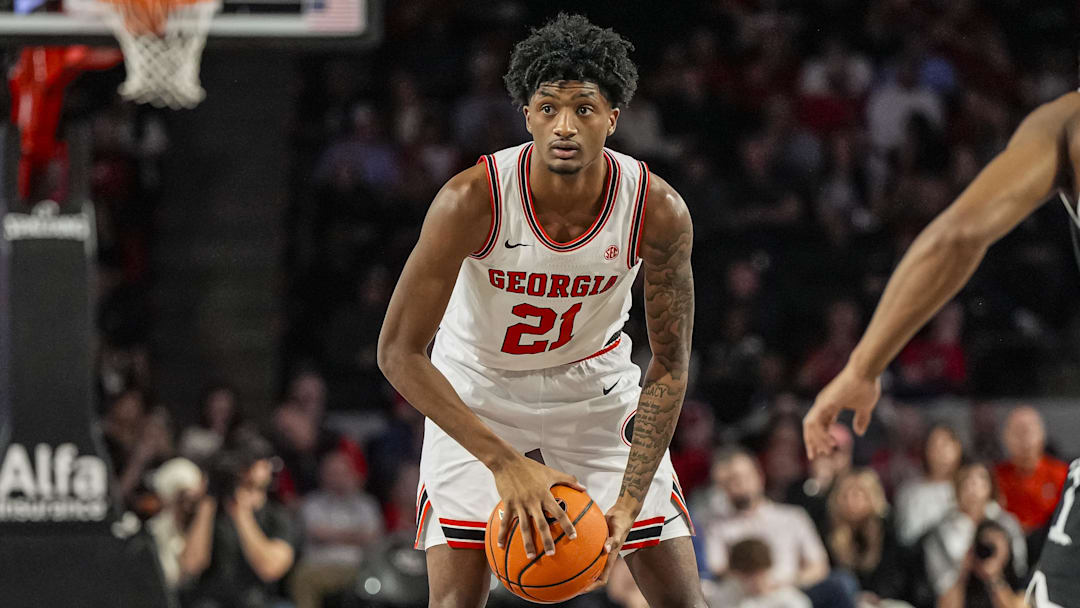 Feb 28, 2026; Athens, Georgia, USA; Georgia Bulldogs forward Jake Wilkins (21) handles the ball against the South Carolina Gamecocks during the first half at Stegeman Coliseum. Mandatory Credit: Dale Zanine-Imagn Images