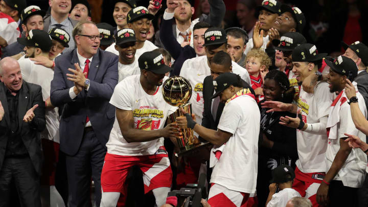 Jun 13, 2019; Oakland, CA, USA; Toronto Raptors center Serge Ibaka (left) and Toronto Raptors guard Kyle Lowry (right) celebrate with the Larry O'Brien Championship Trophy after defeating the Golden State Warriors for the NBA Championship in game six of the 2019 NBA Finals at Oracle Arena. 