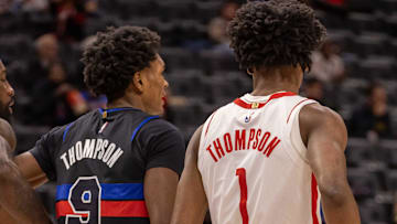 Jan 12, 2024; Detroit, Michigan, USA; Houston Rockets forward Amen Thompson (1) guards his twin Ausar Thompson of the Detroit Pistons
