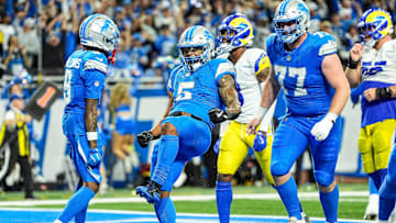 Detroit Lions running back David Montgomery celebrates scoring the winning 1-yard touchdown against the Los Angeles Rams during overtime for a 26-20 victory in the season opener at Ford Field in Detroit on Sunday, Sept. 8, 2024.