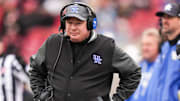 Kentucky Wildcats head coach Mark Stoops on the sidelines as the Louisville Cardinals football team dominated Kentucky 41-0 Saturday, November 29, 2025 in Louisville, Kentucky at L&N Federal Credit Union Stadium.