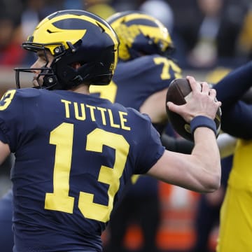 Apr 1, 2023; Ann Arbor, MI, USA; Michigan Wolverines quarterback Jack Tuttle (13) passes during the Spring Game at Michigan Stadium.