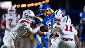 DCA's Carson Sneed (2) runs after a catch with Tipton-Rosemark's Tanner Thornell (12) trying to tackle him during their Division II-A playoff game at Donelson Christian Academy in Nashville, Tenn., Friday, Nov. 8, 2024.