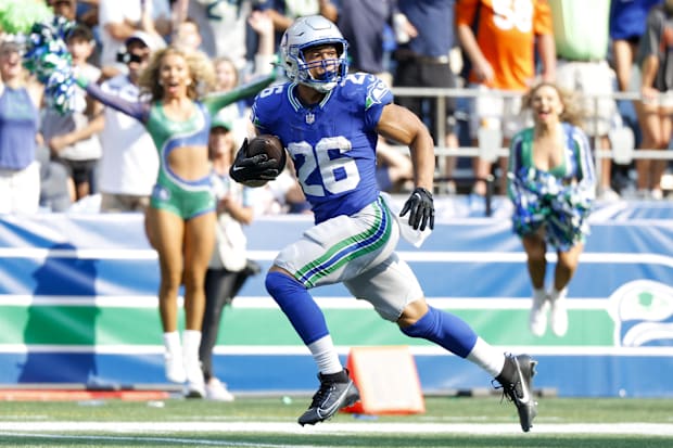 Seattle Seahawks running back Zach Charbonnet (26) catches a touchdown pass.