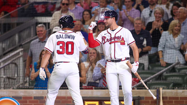 Mar 27, 2026; Atlanta, Georgia, USA; Atlanta Braves catcher Drake Baldwin (30) celebrates with first baseman Matt Olson (28) after a home run against the Kansas City Royals in the third inning at Truist Park. Mandatory Credit: Brett Davis-Imagn Images