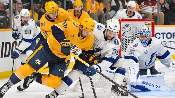 Oct 28, 2025; Nashville, Tennessee, USA; Nashville Predators left wing Erik Haula (56) and Tampa Bay Lightning left wing Brandon Hagel (38) battle for the puck during the third period at Bridgestone Arena. Mandatory Credit: Steve Roberts-Imagn Images Oct 28, 2025; Nashville, Tennessee, USA; Nashville Predators left wing Erik Haula (56) and Tampa Bay Lightning left wing Brandon Hagel (38) battle for the puck during the third period at Bridgestone Arena. Mandatory Credit: Steve Roberts-Imagn Images