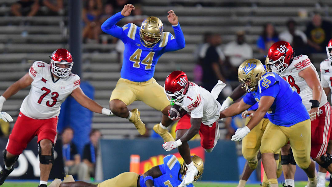 Aug 30, 2025; Pasadena, California, USA; Utah Utes running back Wayshawn Parker (1) runs the ball against the UCLA Bruins during the second half at Rose Bowl. Mandatory Credit: Gary A. Vasquez-Imagn Images