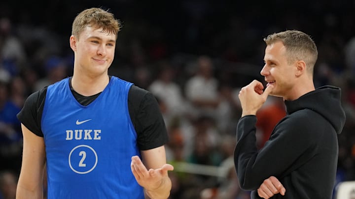 Apr 4, 2025; San Antonio, TX, USA; Duke Blue Devils guard Cooper Flagg (2) talks with head coach Jon Scheyer during a practice session for the Final Four of the 2025 NCAA Tournament.