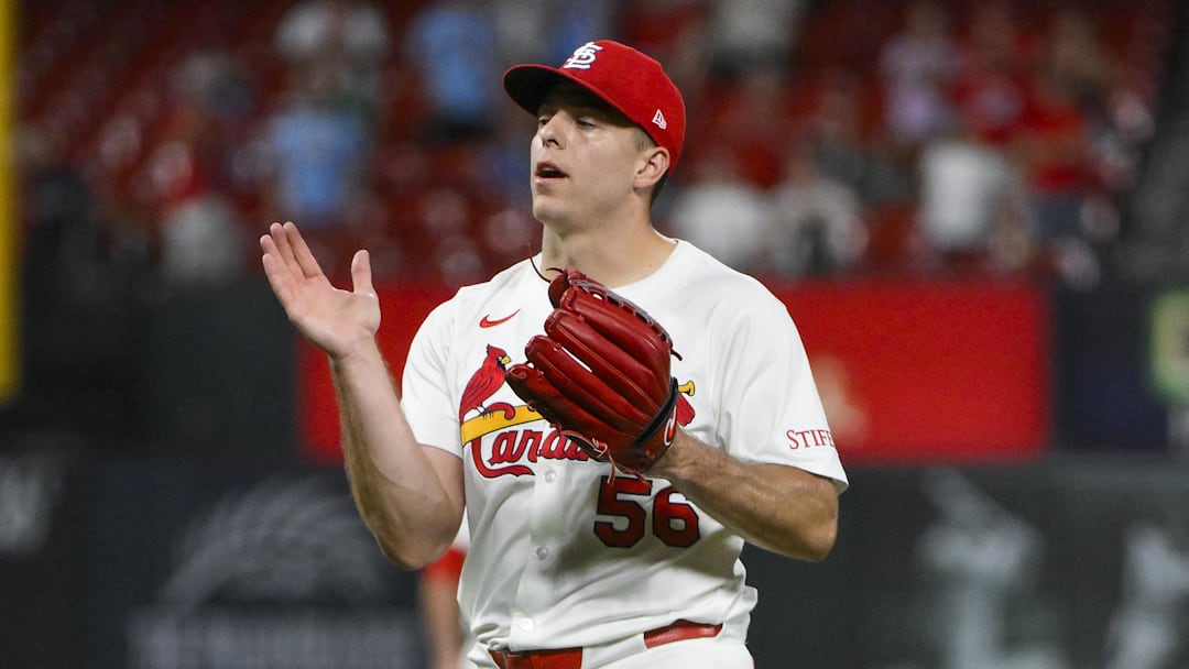 Jul 24, 2025; St. Louis, Missouri, USA;  St. Louis Cardinals relief pitcher Ryan Helsley (56) celebrates after the Cardinals defeated the San Diego Padres at Busch Stadium. Mandatory Credit: Jeff Curry-Imagn Images