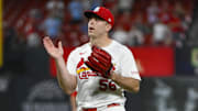 Jul 24, 2025; St. Louis, Missouri, USA;  St. Louis Cardinals relief pitcher Ryan Helsley (56) celebrates after the Cardinals defeated the San Diego Padres at Busch Stadium. Mandatory Credit: Jeff Curry-Imagn Images