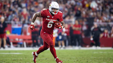 Nov 3, 2024; Glendale, Arizona, USA; Arizona Cardinals running back James Conner (6) against the Chicago Bears in the second half at State Farm Stadium. Mandatory Credit: Mark J. Rebilas-Imagn Images