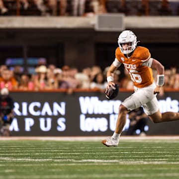 Oct 19, 2024; Austin, Texas, USA; Texas Longhorns quarterback Arch Manning (16) runs the ball against the Georgia Bulldogs during the second quarter at Darrell K Royal-Texas Memorial Stadium. Mandatory Credit: Brett Patzke-Imagn Images