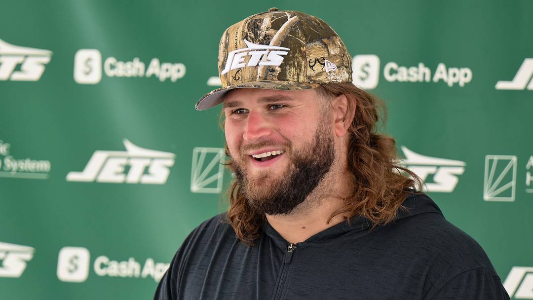 New York Jets center Joe Tippmann (66) speaks at a press conference during training camp at Atlantic Health Jets Training Center. New York Jets center Joe Tippmann (66) speaks at a press conference during training camp at Atlantic Health Jets Training Center.