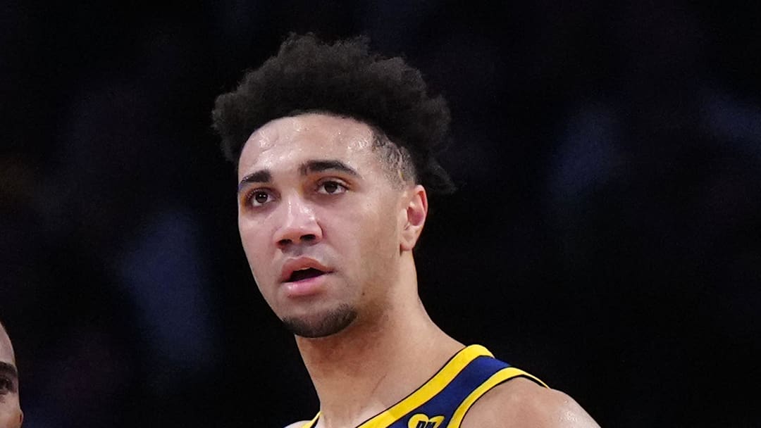 Apr 9, 2024; Los Angeles, California, USA; Golden State Warriors forward Trayce Jackson-Davis (32) and guard Chris Paul (3) react against the Los Angeles Lakers in the first half at Crypto.com Arena. Mandatory Credit: Kirby Lee-Imagn Images