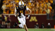 Oct 11, 2025; Minneapolis, Minnesota, USA; Minnesota Golden Gophers quarterback Drake Lindsey (5) runs the ball against the Purdue Boilermakers during the second half at Huntington Bank Stadium. Mandatory Credit: Matt Krohn-Imagn Images
