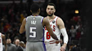 Mar 15, 2023; Chicago, Illinois, USA; Sacramento Kings guard De'Aaron Fox (5) and Chicago Bulls guard Zach LaVine (8) talk after the game at the United Center. Mandatory Credit: Matt Marton-Imagn Images
