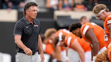 Oklahoma State Head coach Mike Gundy walks on the field before an NCAA football game between Oklahoma State (OSU) and UT Martin in Stillwater, Okla., on Thursday, Aug. 28, 2025.