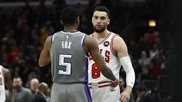 Mar 15, 2023; Chicago, Illinois, USA; Sacramento Kings guard De'Aaron Fox (5) and Chicago Bulls guard Zach LaVine (8) talk after the game at the United Center. Mandatory Credit: Matt Marton-Imagn Images